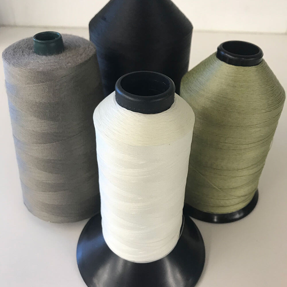 Rolls of polyester thread